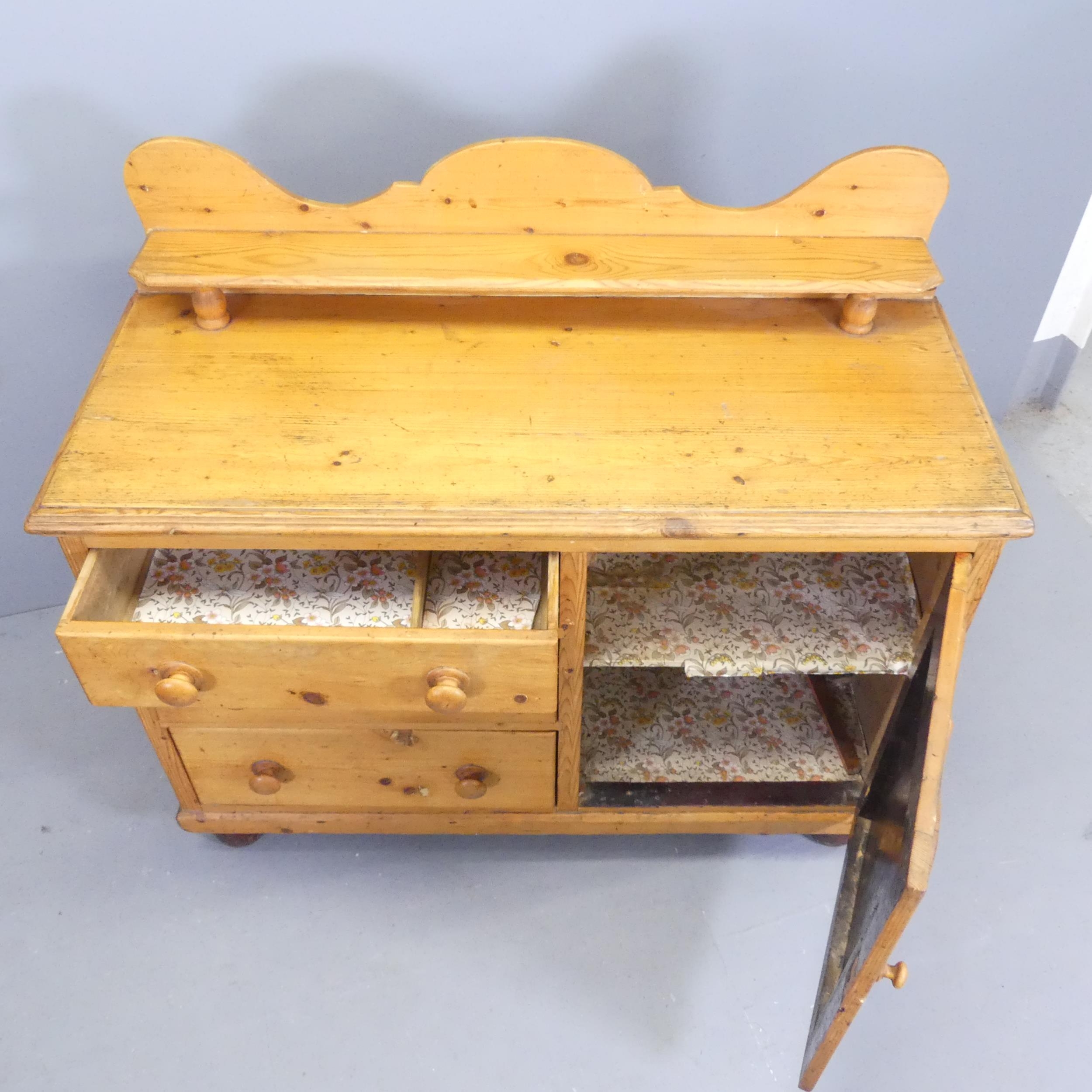 A vintage pine dresser. with three drawers and single panelled door