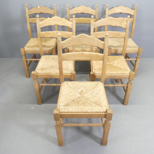 2550 - A set of six modern beech dining chairs with drop-in rush seats.