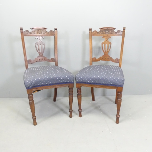 2555 - A pair of Victorian mahogany and upholstered dining chairs.