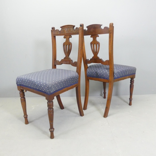 2555 - A pair of Victorian mahogany and upholstered dining chairs.