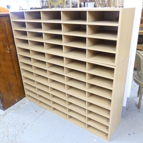 2562 - A modern three-section bank of 60 pigeon holes. 133x124x34cm.