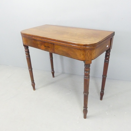 2565 - A Victorian mahogany fold-over card table. 89x77x44cm.