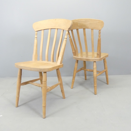 2583 - A set of four modern beech stick-back dining chairs.