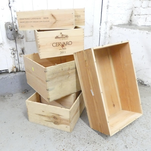 2586 - Seven various modern pine wine crates. Largest 52x19x33cm.