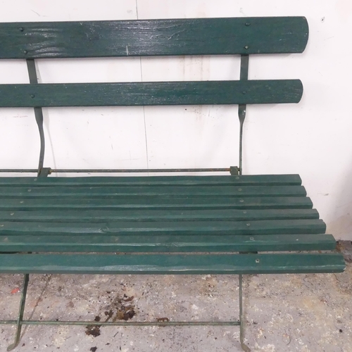 2600 - A painted slatted garden bench with folding metal frame. 129x83x56cm.