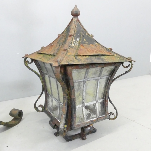 2610 - A painted wrought iron lantern, wired for electric. A/F.