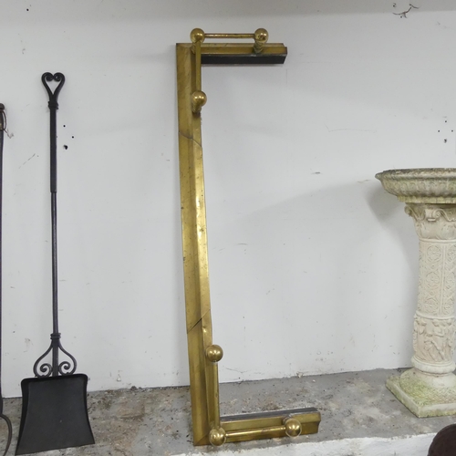 2612 - A brass extending fire surround. Minimum dimensions 132x20x40cm.