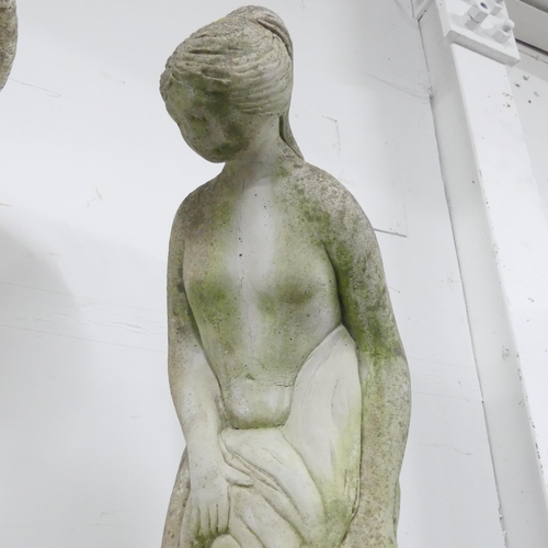 2615 - A weathered concrete garden statue, study of a classical lady. Height 79cm.