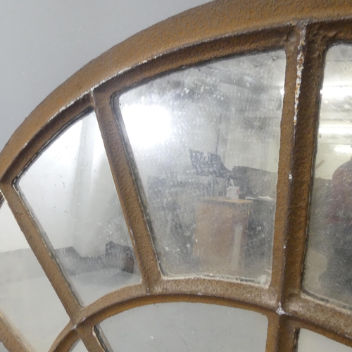 2620 - A Vintage arch top metal framed mirror 135x103cm.