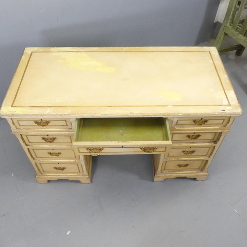 2629 - A painted wooden twin-pedestal writing desk, with nine drawers and bracket feet. 122x77x56cm.