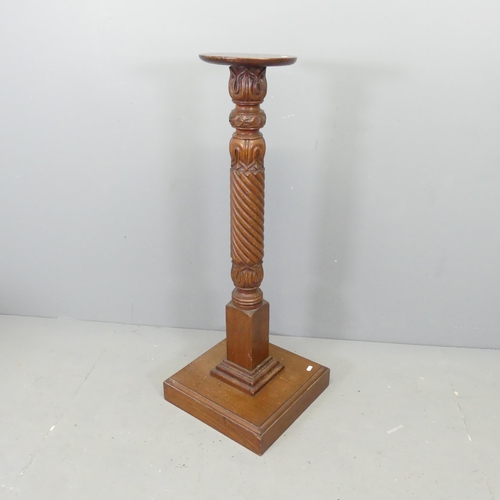 2631 - A mahogany pedestal mounted on square base. Height 104cm.