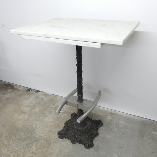 2632 - A rectangular marble topped pub table on cast iron base. 80x112x60cm. WITH THE OPTION TO PURCHASE TH... 