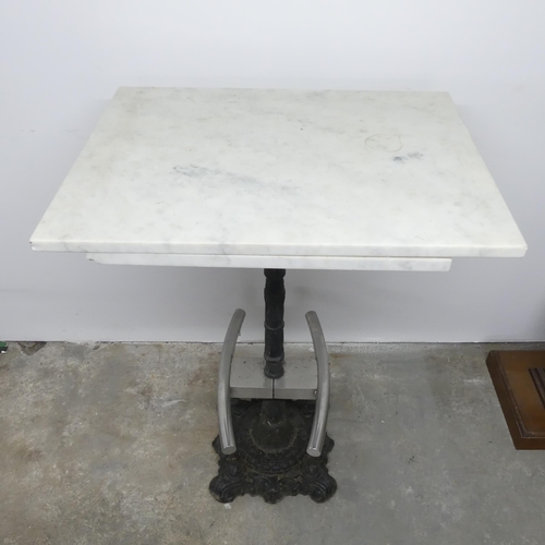 2632 - A rectangular marble topped pub table on cast iron base. 80x112x60cm. WITH THE OPTION TO PURCHASE TH... 