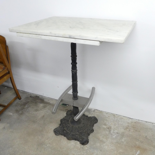 2633 - A rectangular marble topped pub table on cast iron base. 80x112x60cm. WITH THE OPTION TO PURCHASE TH... 