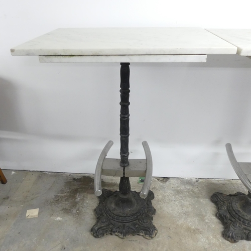 2634 - A rectangular marble topped pub table on cast iron base. 80x112x60cm.