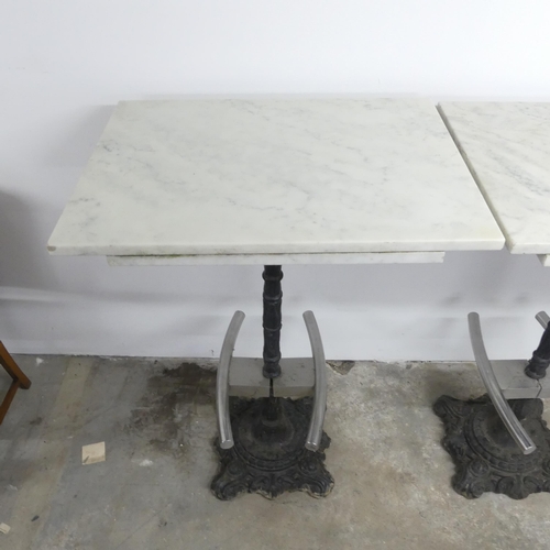 2634 - A rectangular marble topped pub table on cast iron base. 80x112x60cm.