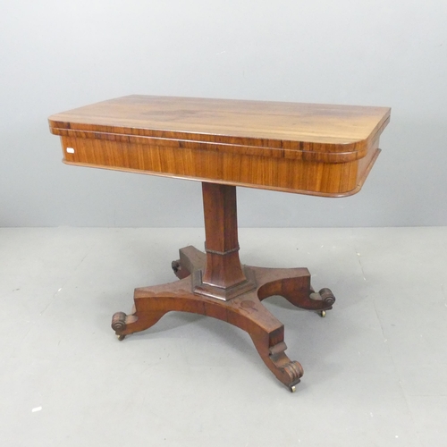 2647 - A 19th century rosewood fold-over card table, with hexagonal central column on platform base. 89x74x... 