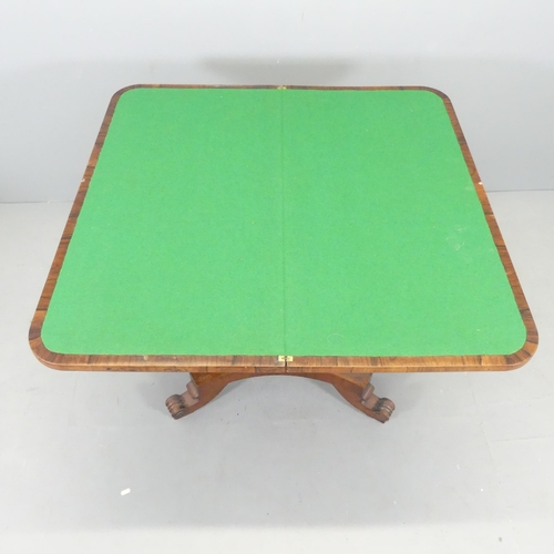 2647 - A 19th century rosewood fold-over card table, with hexagonal central column on platform base. 89x74x... 