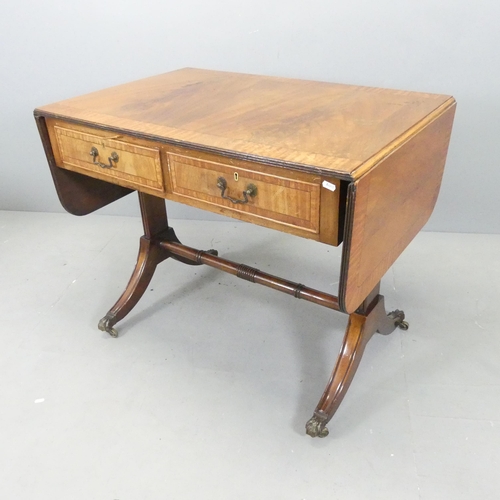 2649 - An antique cross-banded mahogany and ebony strung drop-end sofa table, with two drawers. 92x75x61cm.