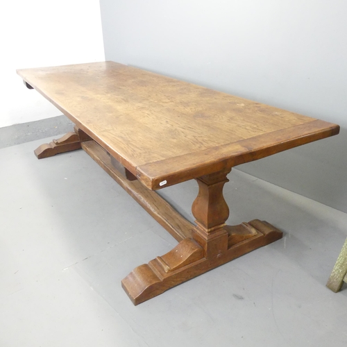 2655 - A large and impressive oak refectory dining table. 274x76x94cm.