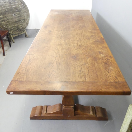 2655 - A large and impressive oak refectory dining table. 274x76x94cm.