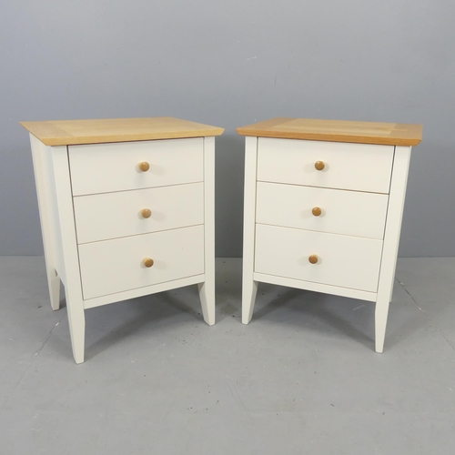 2658 - A pair of modern light oak effect three drawer bedside chests. 49x63x40cm.