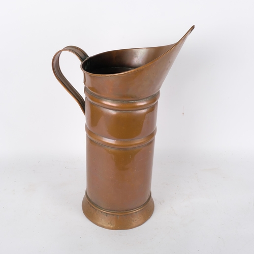 734 - An Antique copper water jug or pitcher, H55cm