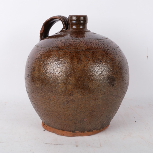 789 - A glazed terracotta flagon, H26cm, rim chip