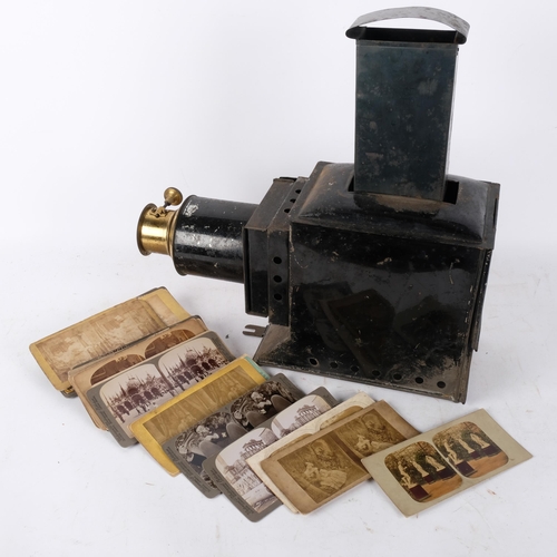 796 - A slide projector with brass mounts, and 2 boxes of glass slides, mainly topographical, and a select... 