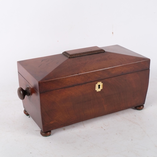 804 - A 19th century mahogany sarcophagus tea caddy, with fitted interior and cut-glass mixing bowl, and k... 