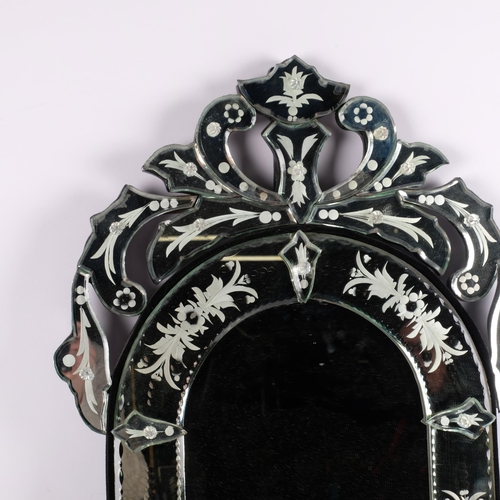 859 - A Venetian design arch-top wall mirror, H76cm