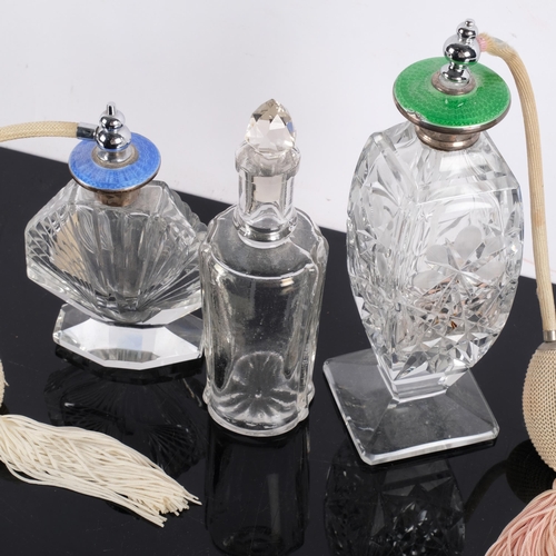 880 - 2 cut-glass silver and enamel atomiser perfume bottles, and a moulded glass bottle and stopper (3)