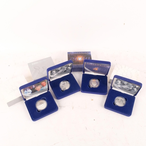 902 - 4 British Commemorative silver proof crowns' in original box and papers