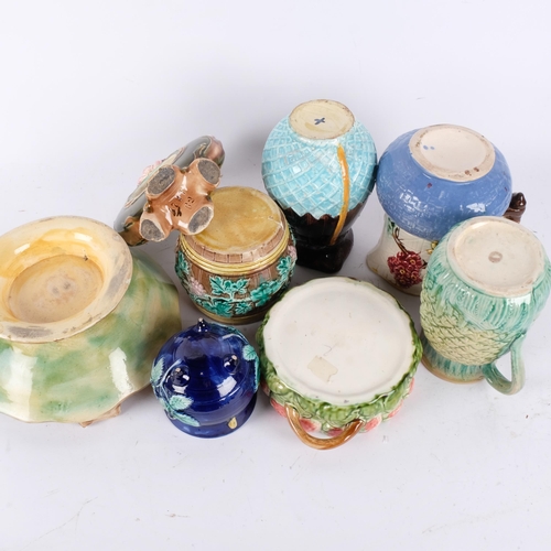 131 - A group of Victorian and later Majolica jugs, 2-handled basket, vase, etc (8)