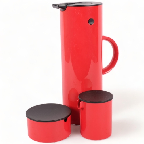 138 - ERIC MAGNUSSEN for STELTON, DENMARK - a 3-piece red plastic set, comprising a vacuum jug, EM77, crea... 