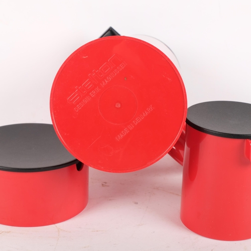 138 - ERIC MAGNUSSEN for STELTON, DENMARK - a 3-piece red plastic set, comprising a vacuum jug, EM77, crea... 