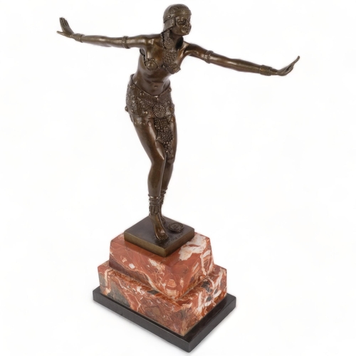 140 - An Art Deco style bronze study of a dancing figure, on marble stand, H48cm