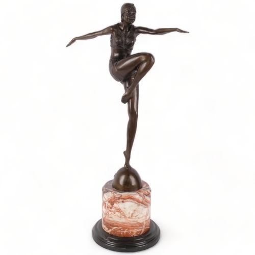 141 - An Art Deco style bronze study of a dancing figure, on marble stand, H56cm