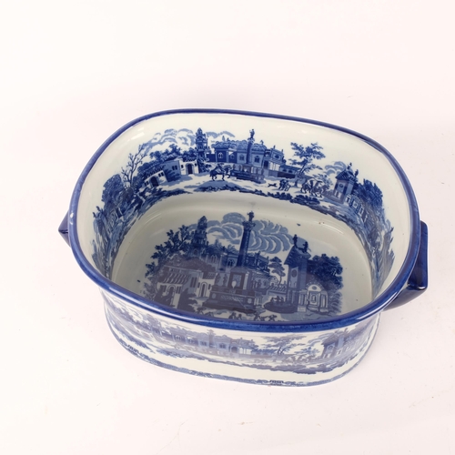 150 - A large reproduction blue and white 2-handled foot bath