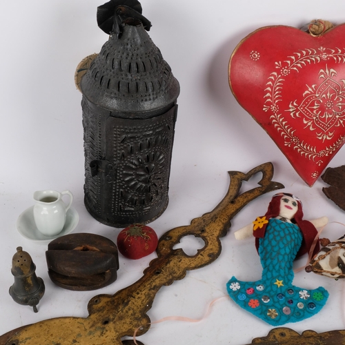 154 - A box of various items, including a painted metal heart, oversized clock hands, etc