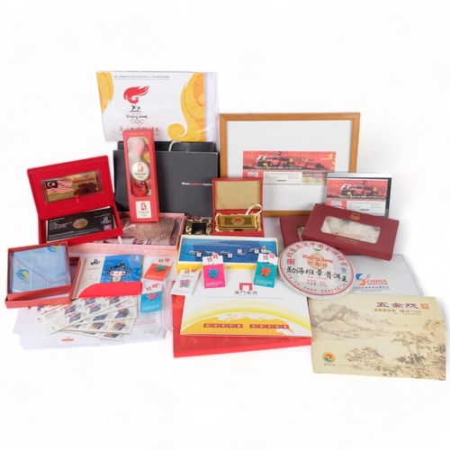 155 - A large quantity of Chinese Olympic commemorative wear, including the Olympic Games tea leaves, vari... 