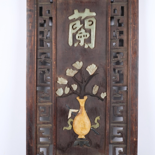 158 - A Chinese hardwood plaque with pierced and floral stone decoration. 82x37cm.