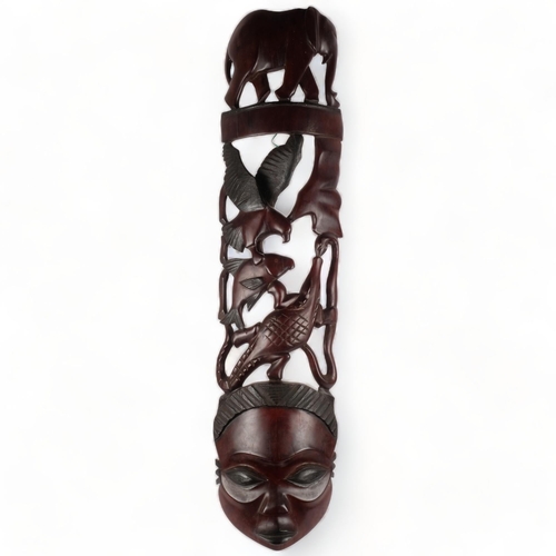 159 - An African carved hardwood figural panel, L110cm