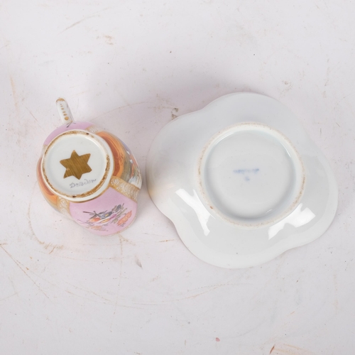 166 - An Antique Dresden quatrefoil cup and saucer, painted pink and white panels decorated with flowers a... 