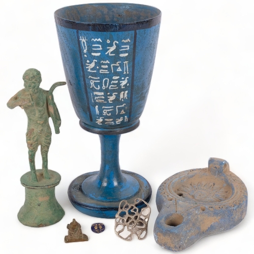 168 - A group of Archaic type pieces, including an oil lamp, painted turned wood bowl, verdigris bronze fi... 