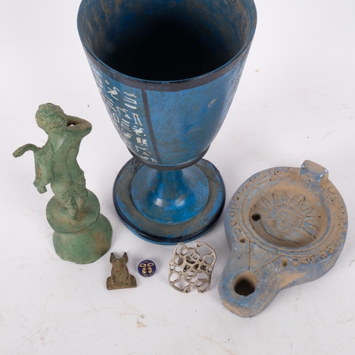 168 - A group of Archaic type pieces, including an oil lamp, painted turned wood bowl, verdigris bronze fi... 