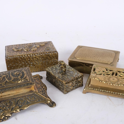 173 - A group of various embossed brass desk stamp boxes, a Vesta box surmounted by a mouse, an Art Nouvea... 