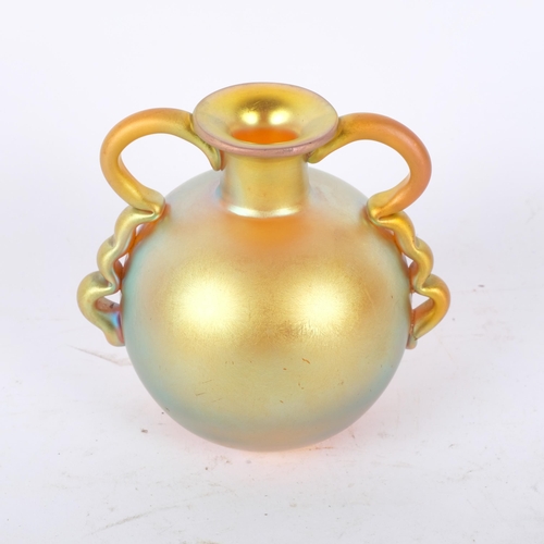 176 - WMF - An early 20th century Myra-krystall 2 handled globular glass vase with gold and purple iridesc... 