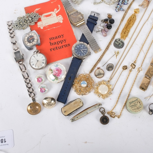 180 - A box of various items, including a silver-cased fob watch, Vintage Timex wristwatch, a booklet Many... 