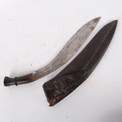 189 - A Malaysian kukri knife and scabbard